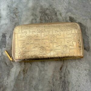Gold Embossed Tory Burch Wallet.